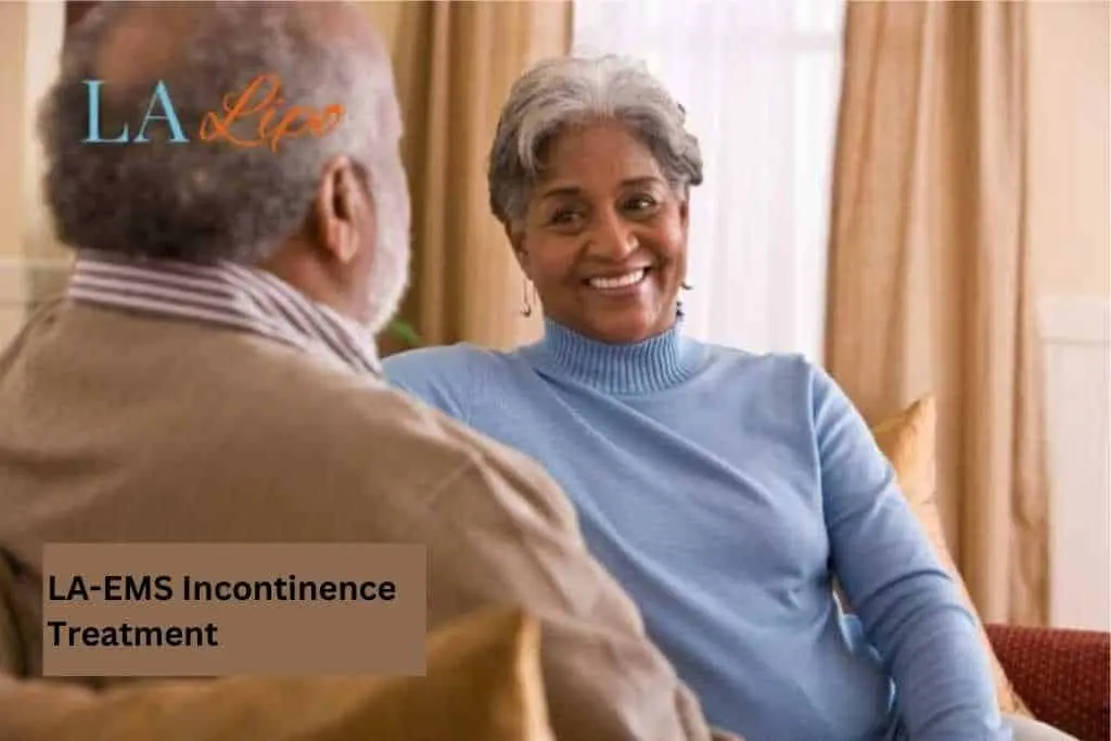 Couple sat smiling at each other - LA-EMS treatment Royal Wootton Bassett