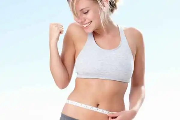 woman happy after fat reduction treatment Royal Wootton Bassett